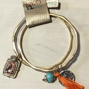 Metal bangles with charms